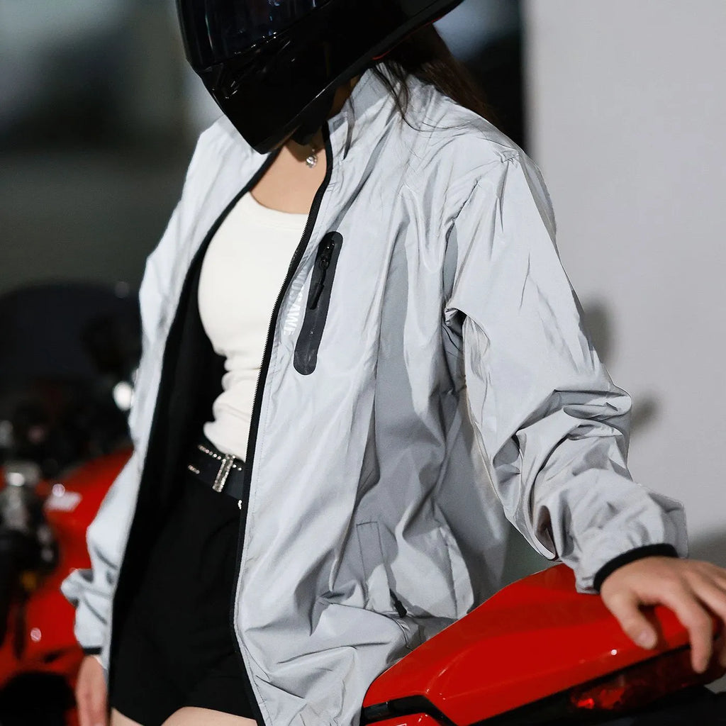 Waterproof polyester windproof long sleeve coat in silver, shown on a hanger.