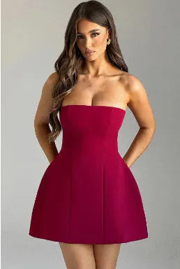 Women's solid colour backless A-line tube dress on a hanger, shown in a short length with a high waist.
