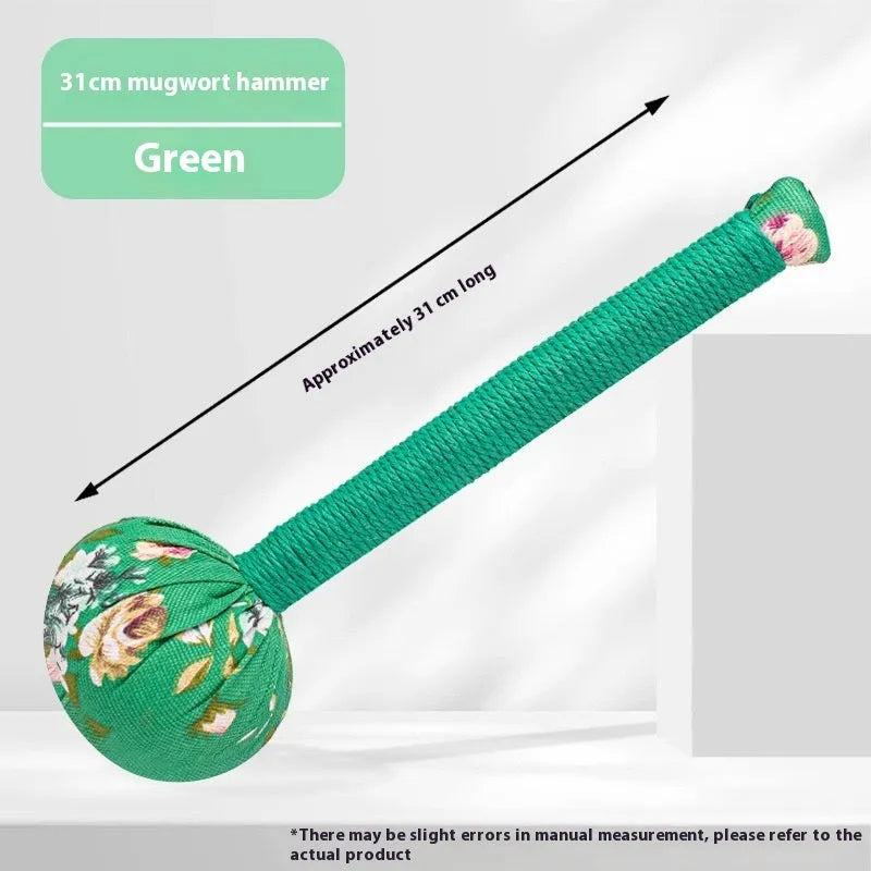Argy wormwood massage hammer in green colour showing hand-held design for neck and shoulder massage