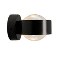 Modern small wall lamp in chrome finish for bedside or hallway lighting