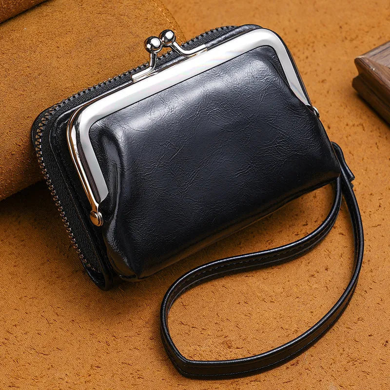 Ladies leather coin purse with a metal buckle clip, shown in coffee colour