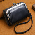 Ladies leather coin purse with a metal buckle clip, shown in coffee colour
