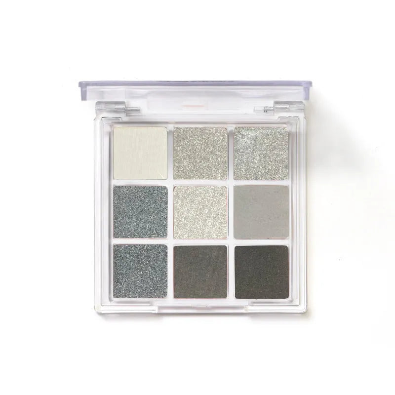 Nine-colour smoked eye shadow palette with white, silver, black, and iron grey shades