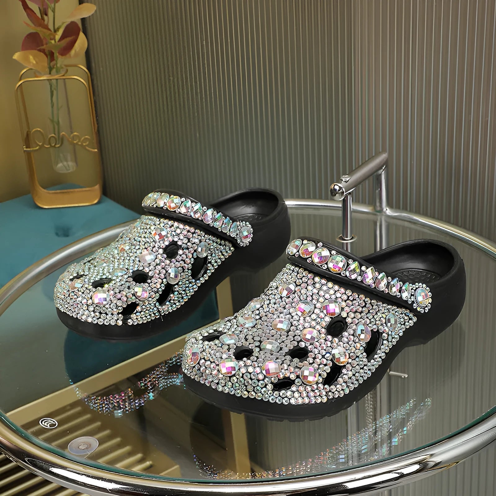 Black platform sandals for women with a rhinestone hole design and EVA construction.