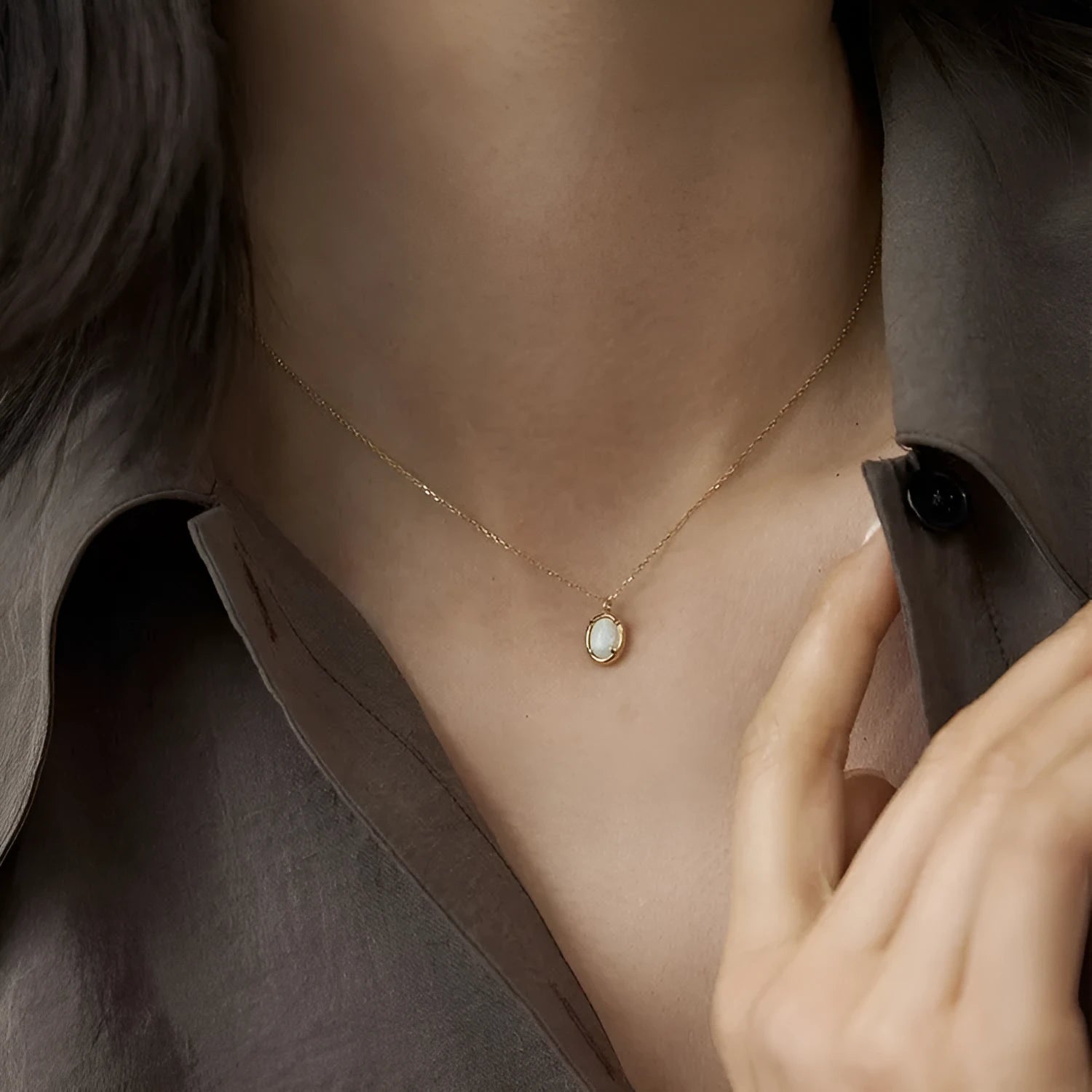 Oval geometric jelly opal pendant necklace in sterling silver with gold or white gold plating.