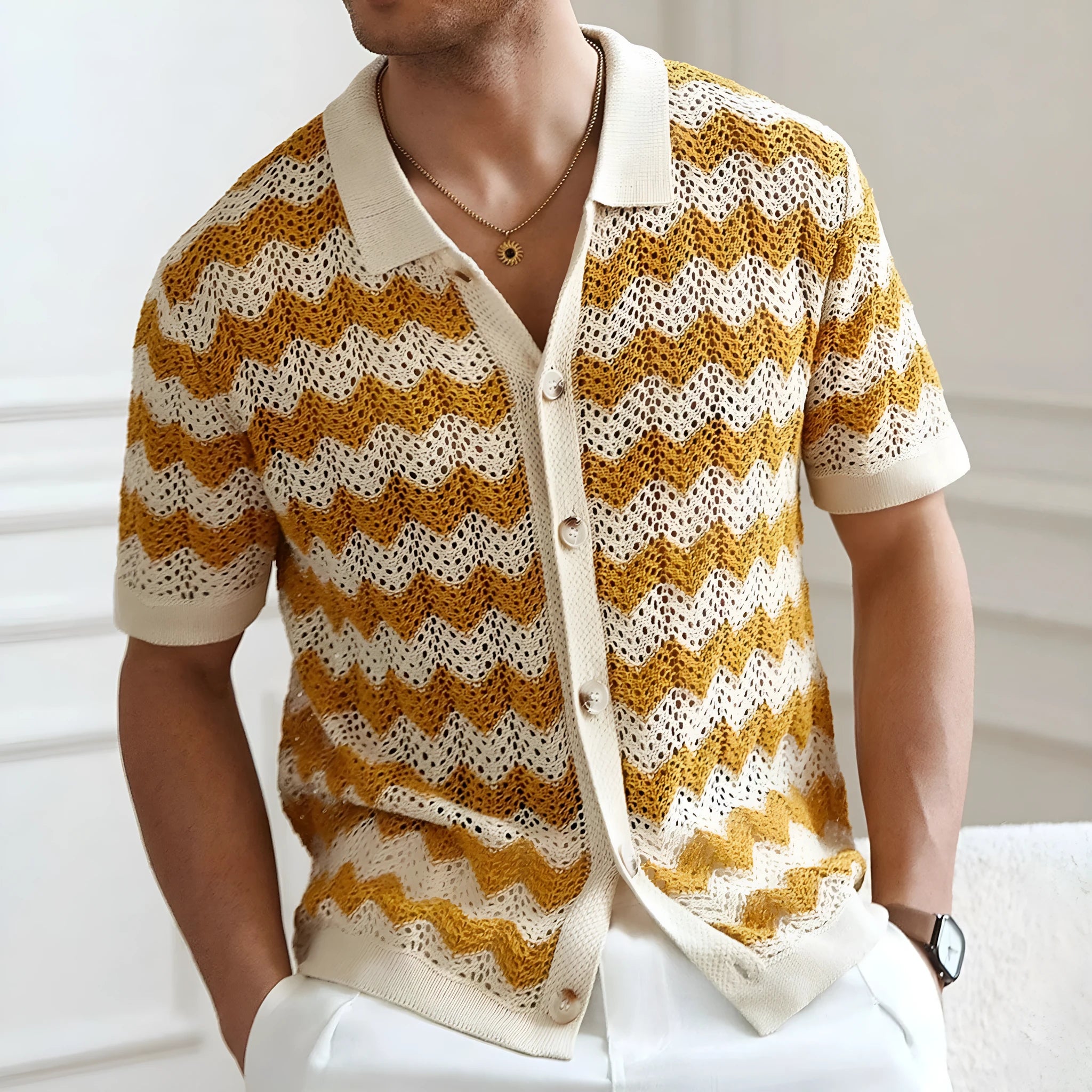 Short sleeve corrugated knit sweater in blue, brown, or yellow with a textured hollow jacquard and flocking design.