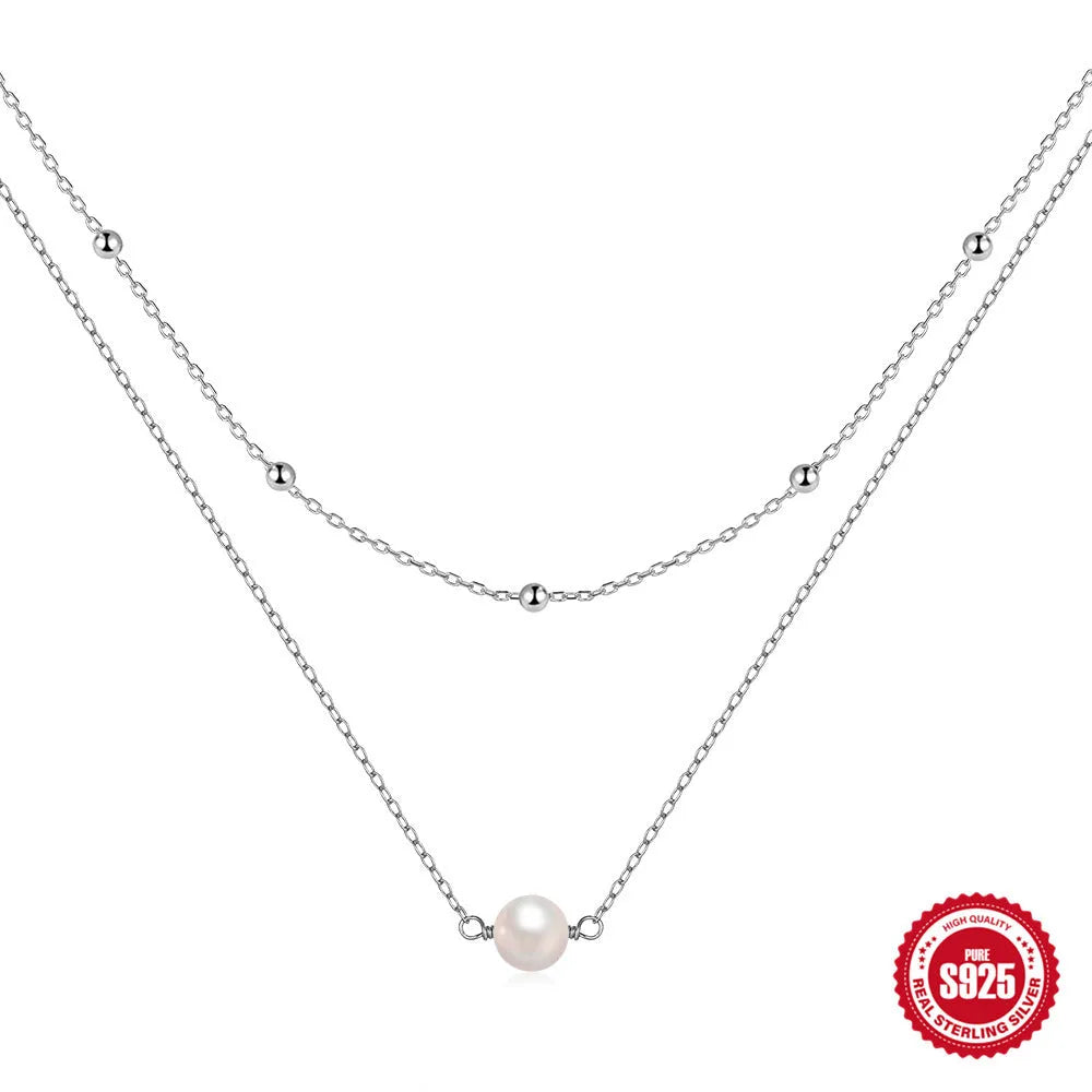 S925 sterling silver necklace with double layer design and twin pearls in gold or white gold colour