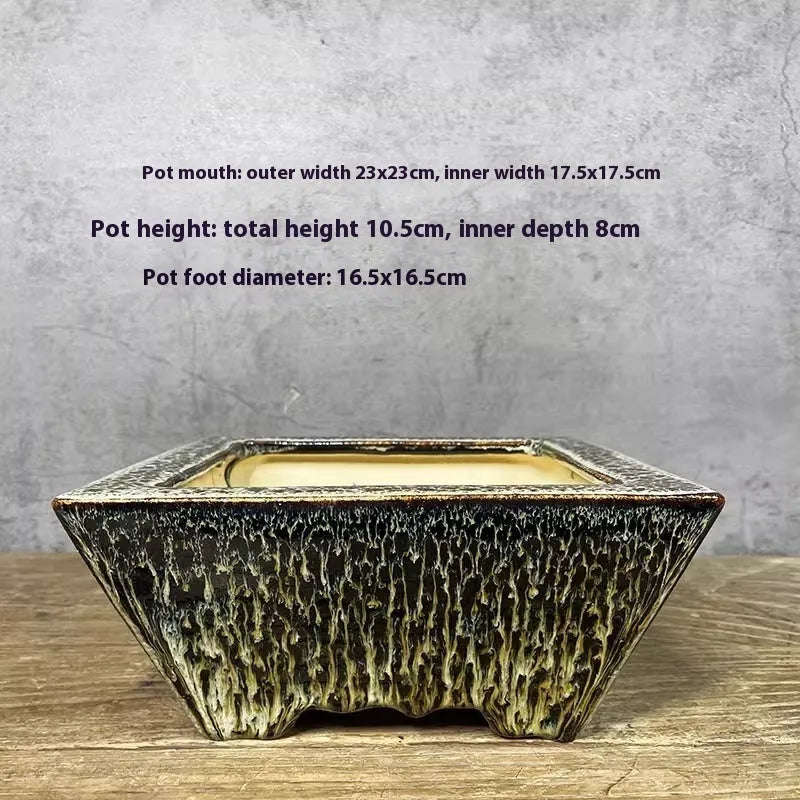 Yellow ceramic flower basin planter on a tabletop, suitable for indoor or outdoor use with small plants