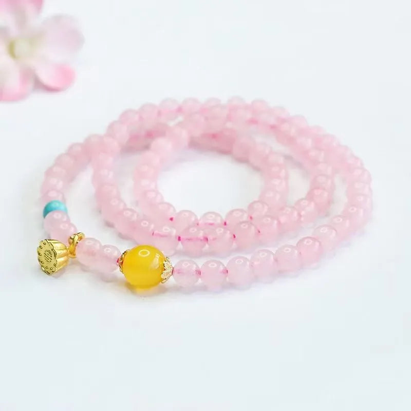 Pink crystal multi-circle bracelet with classic Pi Xui design and artificial crystal construction