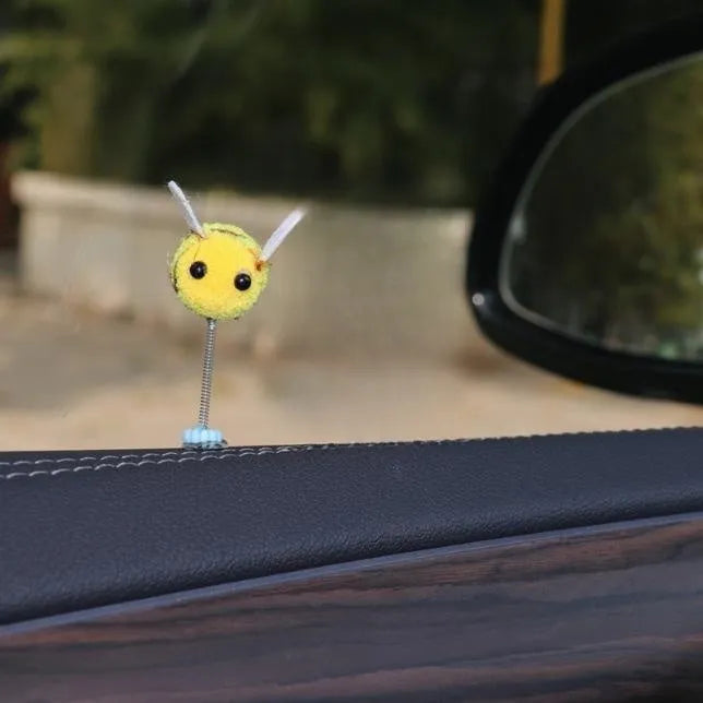 Swing spring bee car decoration made from soft fur ball material measuring 3x3cm