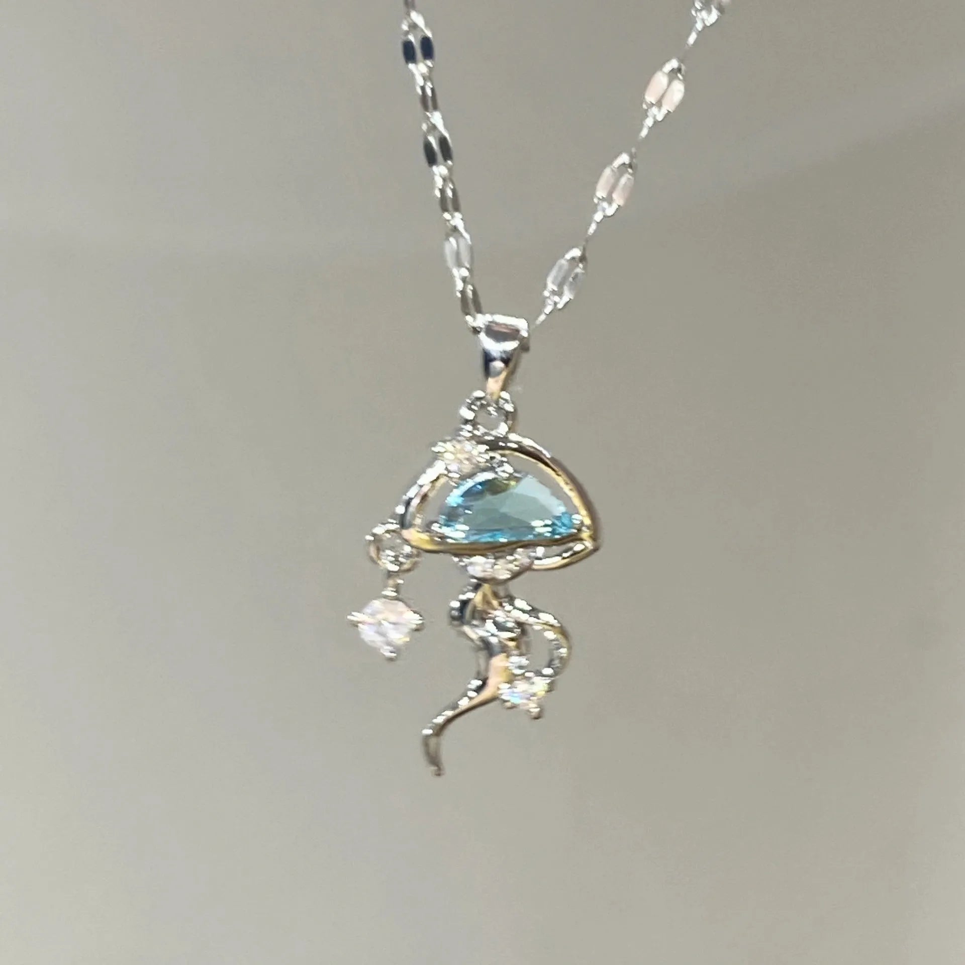 S925 sterling silver blue jellyfish necklace with white gold colour finish on adjustable chain
