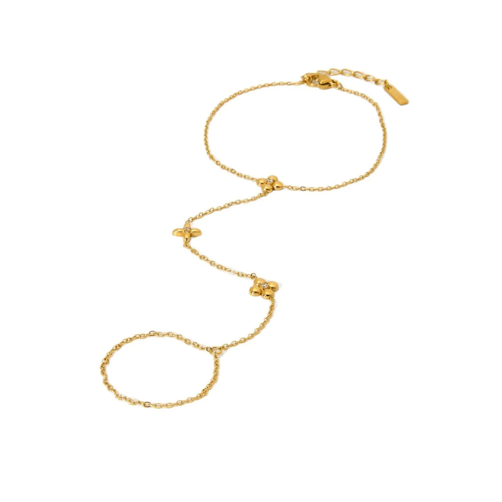 Gold-coloured stainless steel women's bracelet with geometric floral and eight-pointed star design.