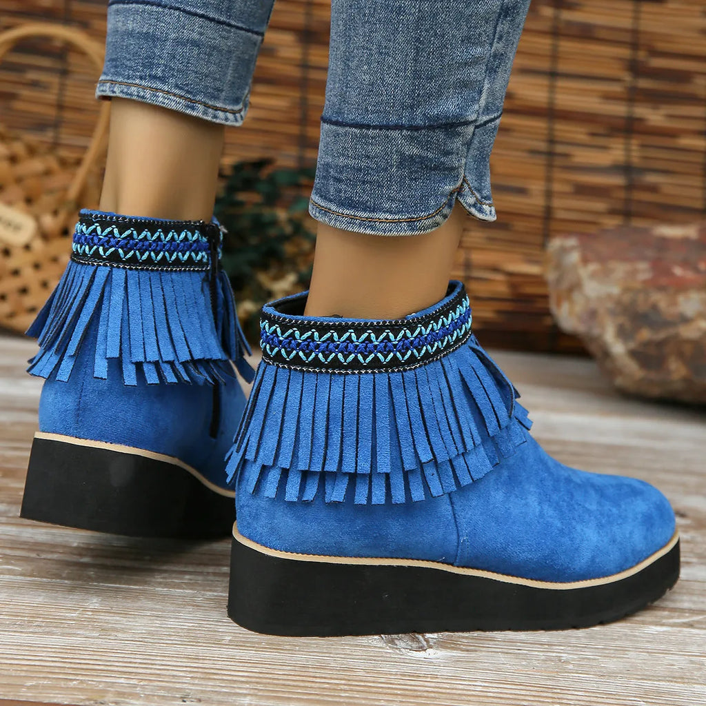 Women's suede wedge ankle boot with side zipper and tassel detail in black