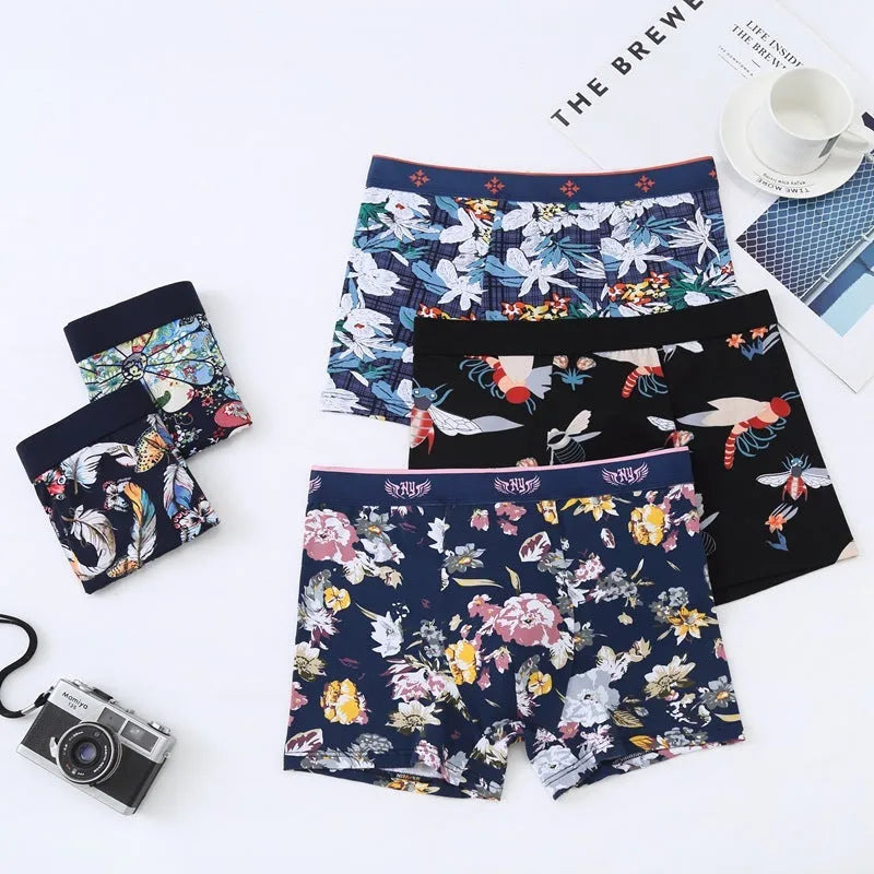 Men's cotton boxer shorts with floral print, showing U-shaped design and mid waist.
