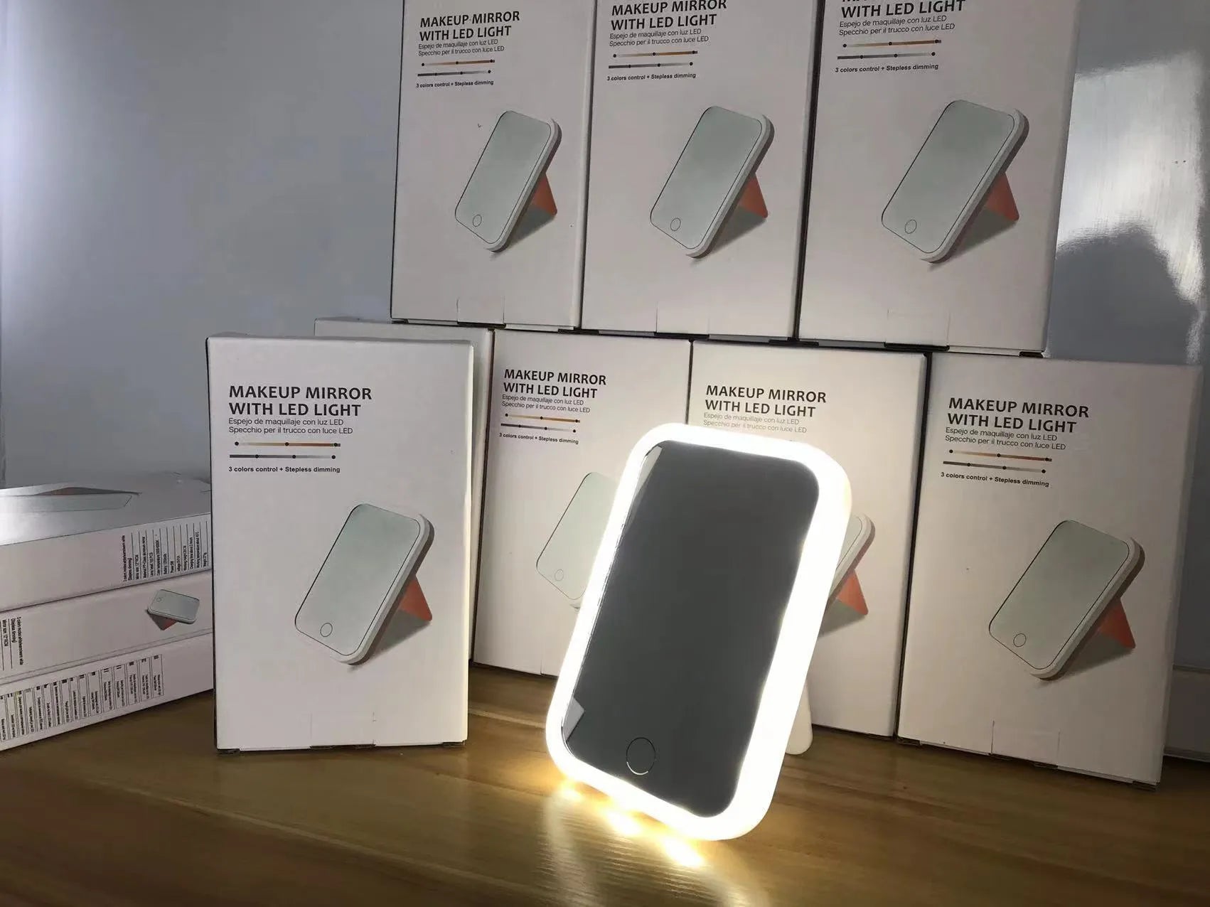 Square LED makeup mirror with smart touch light in pink colour, plastic frame, silver mirror lens