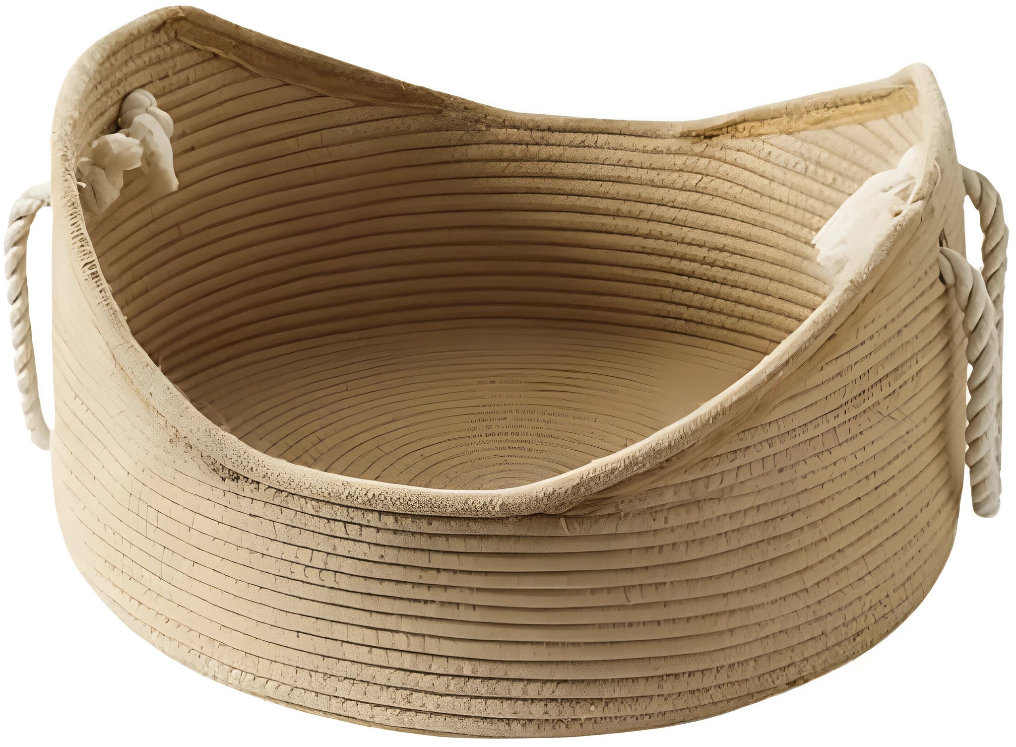Wicker cat bed basket with a corrugated scratching board inside, shown in a home setting.
