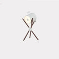 Modern wooden three fork floor lamp with acrylic shade in living room setting