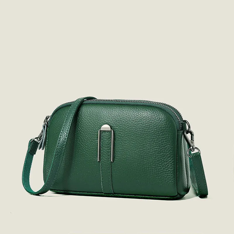 Minimalist crossbody bag in top-grain leather with spliced design, horizontal square shape, inner zippered pocket
