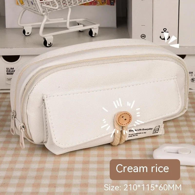 Canvas pencil case in green, beige, blue, or grey storing about 80 pens