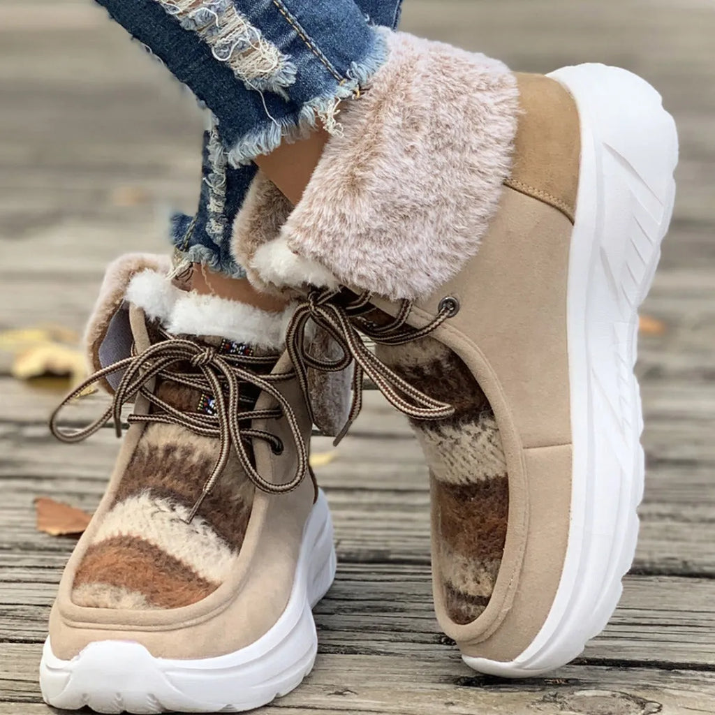 Women's beige suede snow boots with lace-up front and thick rubber sole