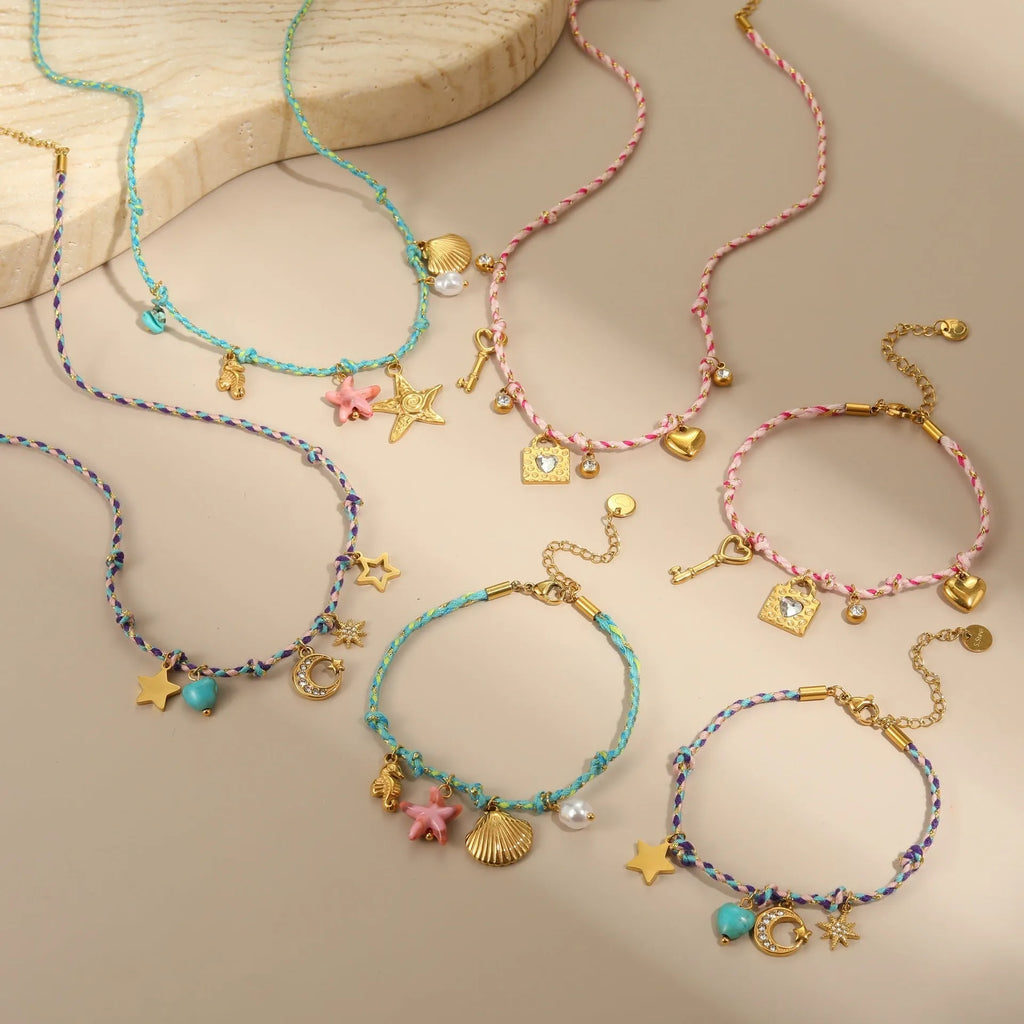Handmade stainless steel necklace with coloured braided rope detail and geometric pendant