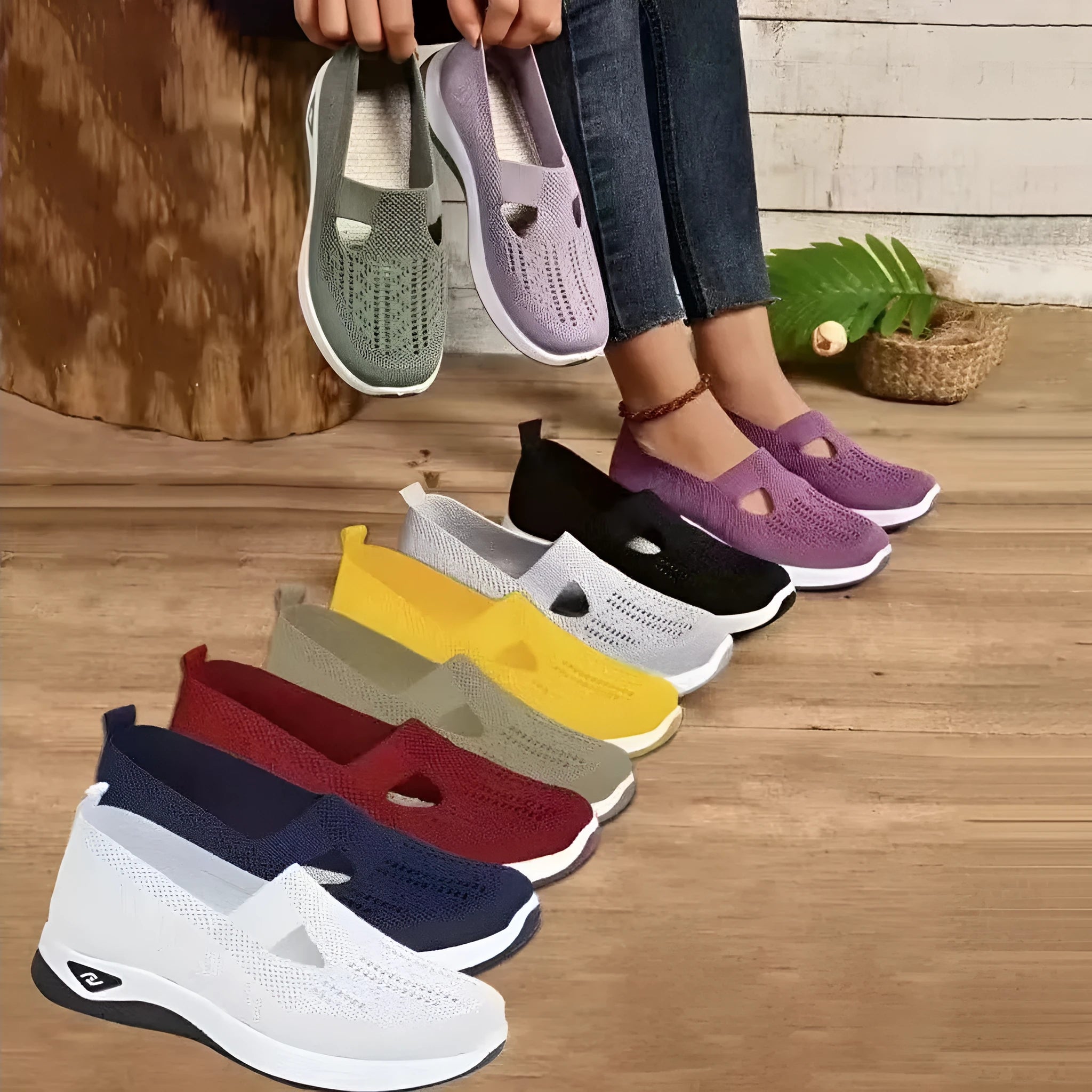 Women's light grey mesh casual flats with a T-strap and round toe on a soft PVC sole.