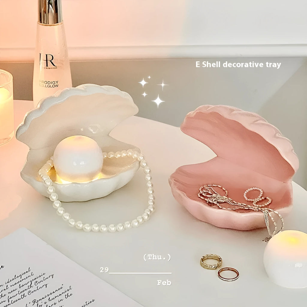 White porcelain night lamp with storage tray in modern design, available with pink or white shell options
