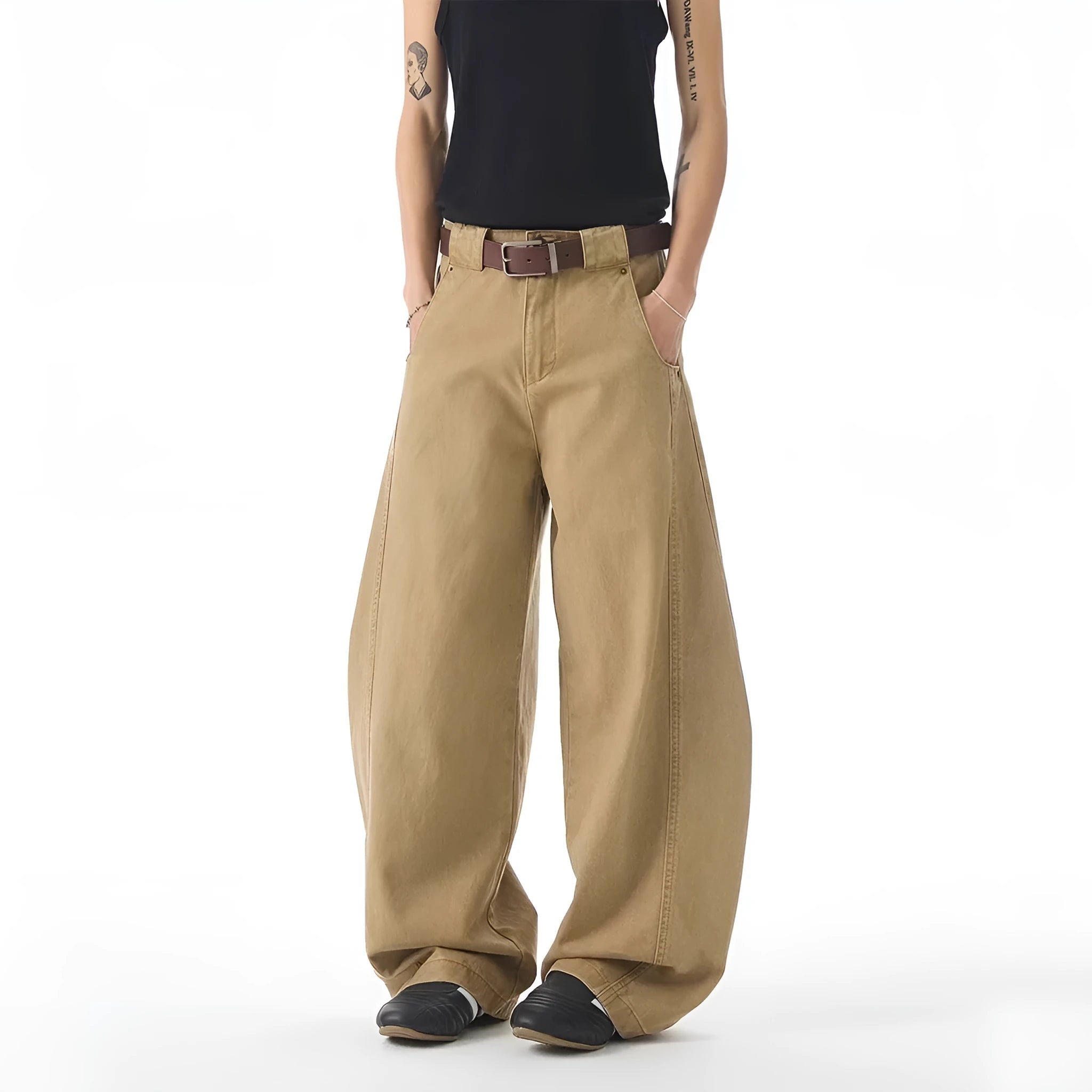 Men's brown straight-leg casual denim jeans with a loose fit and cardigan-style button fly.