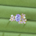 Women's open ring with flower pearl zircon design in yellow or light purple colour
