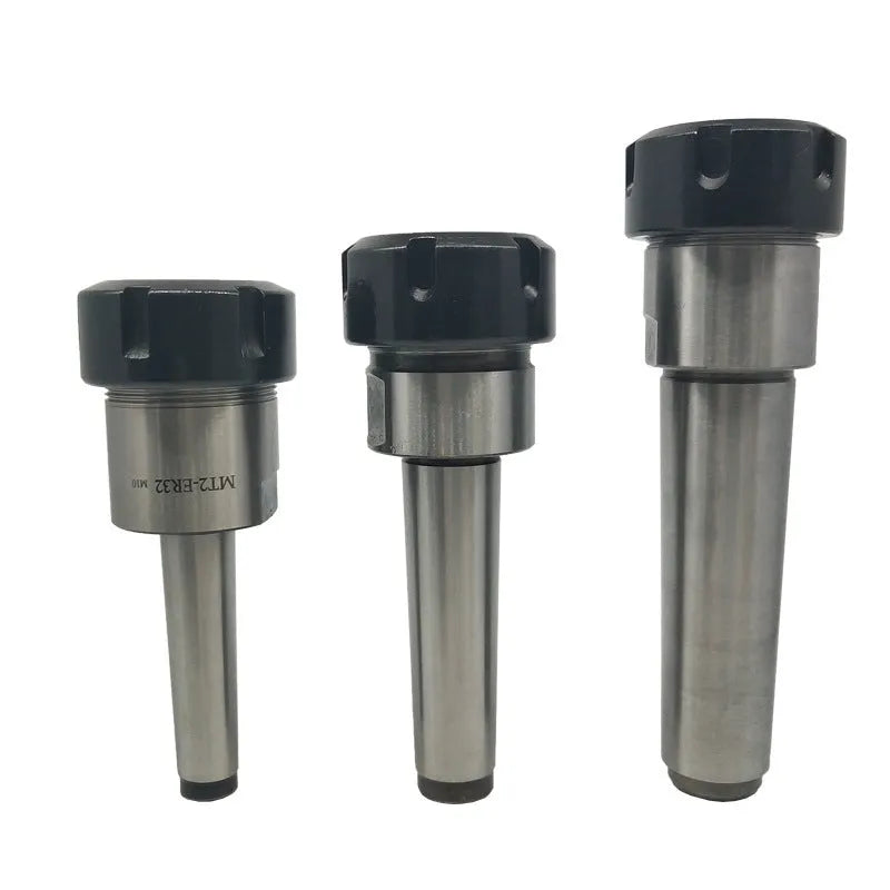ER32 collet set with 19 collets, Morse taper arbor, and wrench on workbench