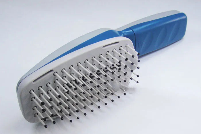 Negative ion pet comb with removable brush head for grooming and odour removal