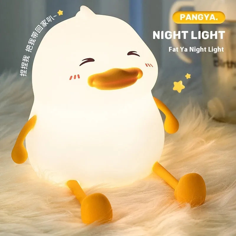 Chubby silicone pat night light with phone holder function on desk