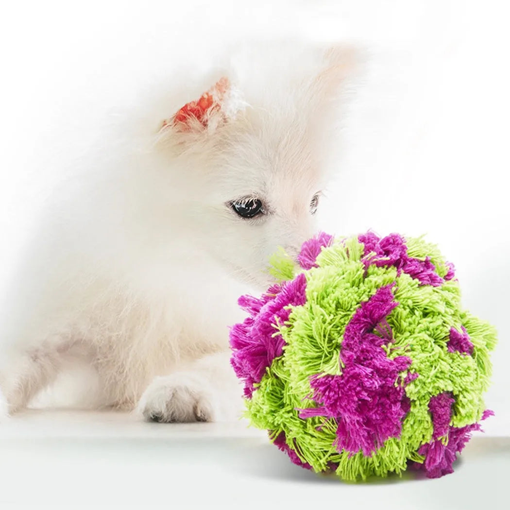 Purple plush dog chew toy with seaweed ball knot design measuring 15cm diameter