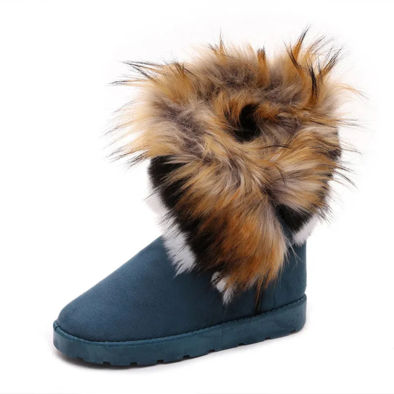Women's winter snow boots in black with fluffy fox fur trim and suede upper