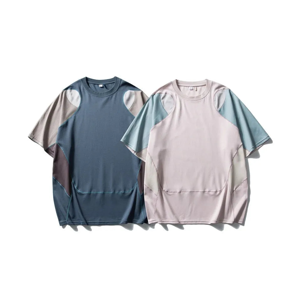 Men's loose blue short sleeve t-shirt with raglan sleeves on a hanger.