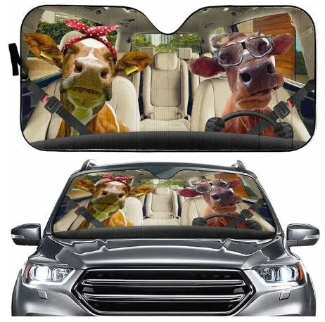 Telescopic aluminium foil car sun shield expanded on a dashboard