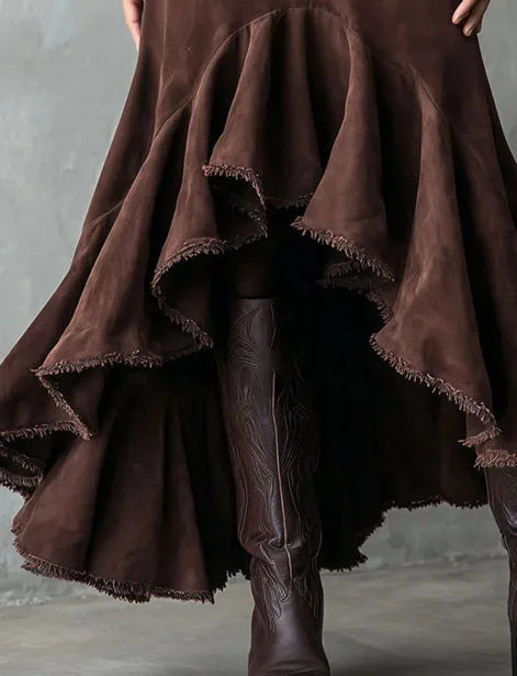 Brown women's maxi skirt with high-low hem and ruffle details in a Western leisure style.