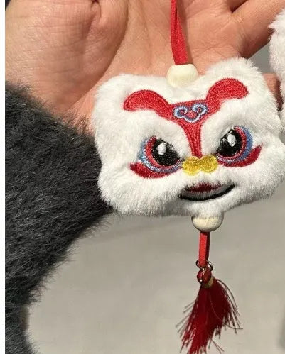 Handmade Chinese style plush lion tassel ornament keychain with star stone details in blue colour
