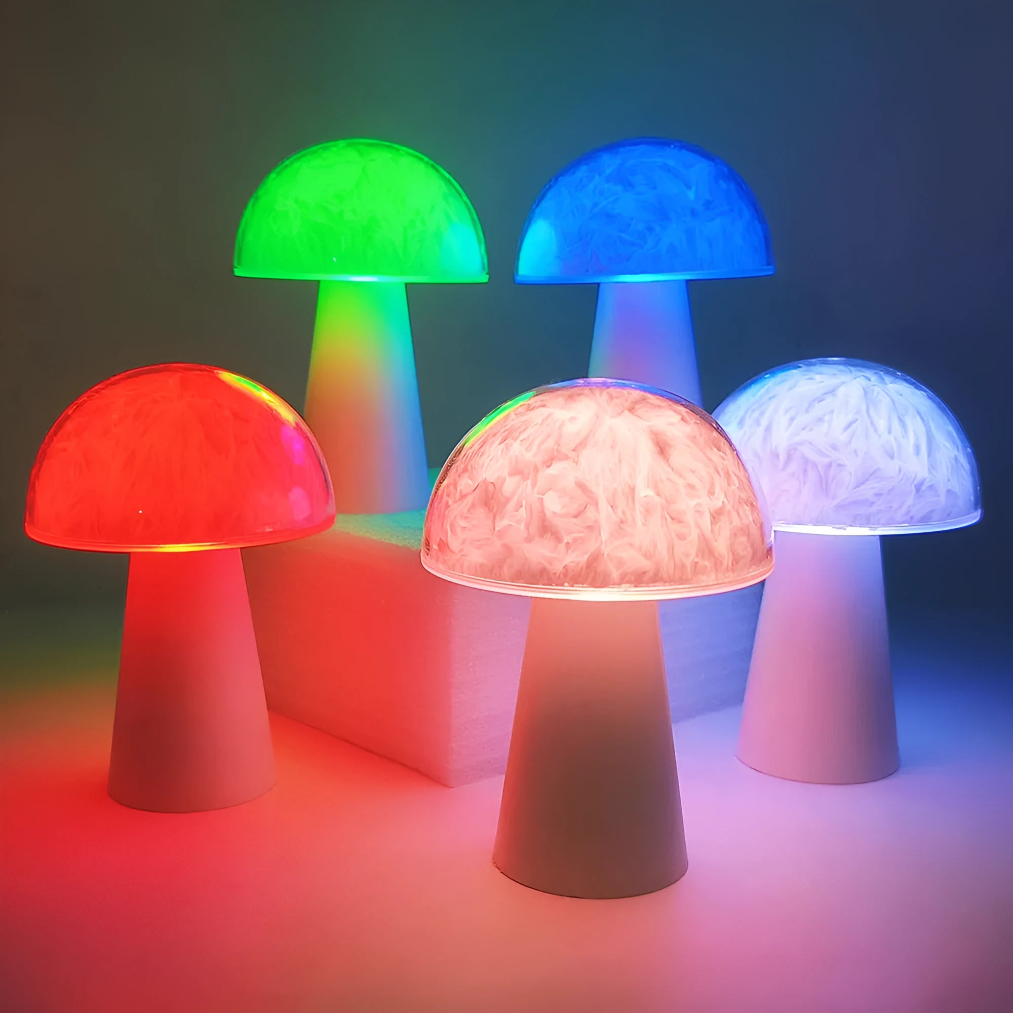 Mushroom-shaped RGB night light with remote control on wooden surface