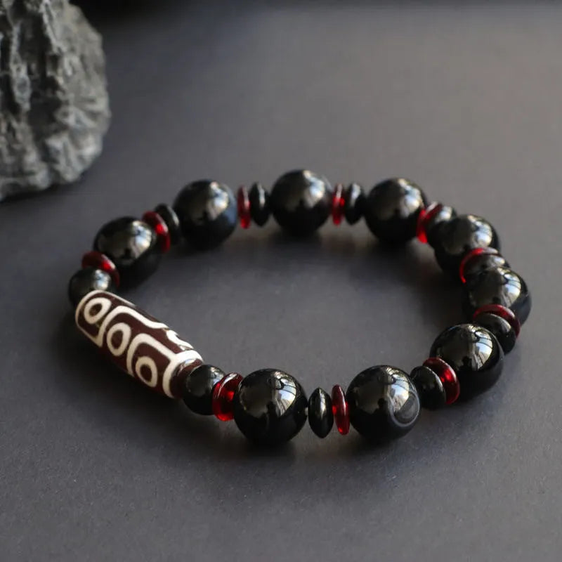Black agate dzi bead bracelet with geometric 11mm chalcedony beads