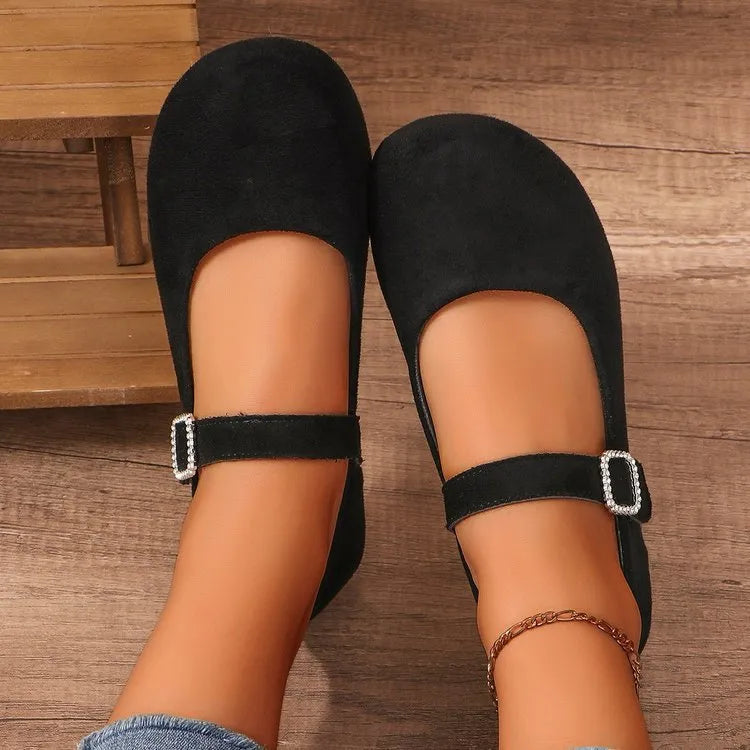 Black canvas fisherman shoes with rubber sole and low-top design