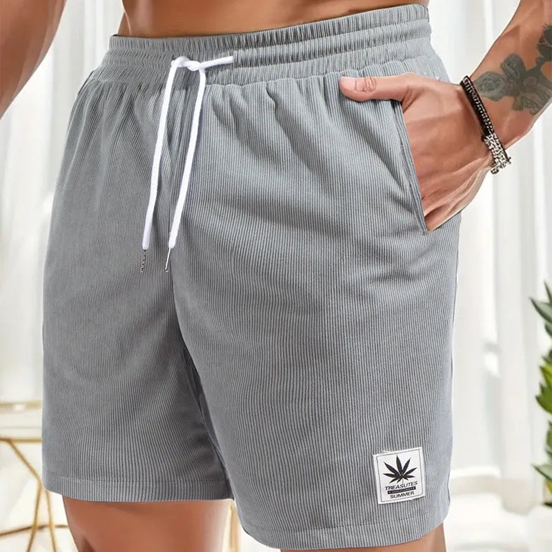 Men's straight cut summer shorts with a drawstring waist in black, blue, gray, or khaki.