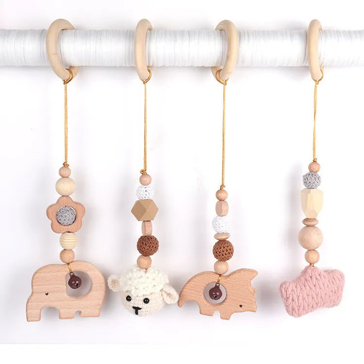 Beech wood baby rattle toy with animal decoration, 28cm long, available in six colours