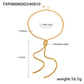 Gold knotted tassel pendant on long snake chain necklace with matching titanium steel earrings