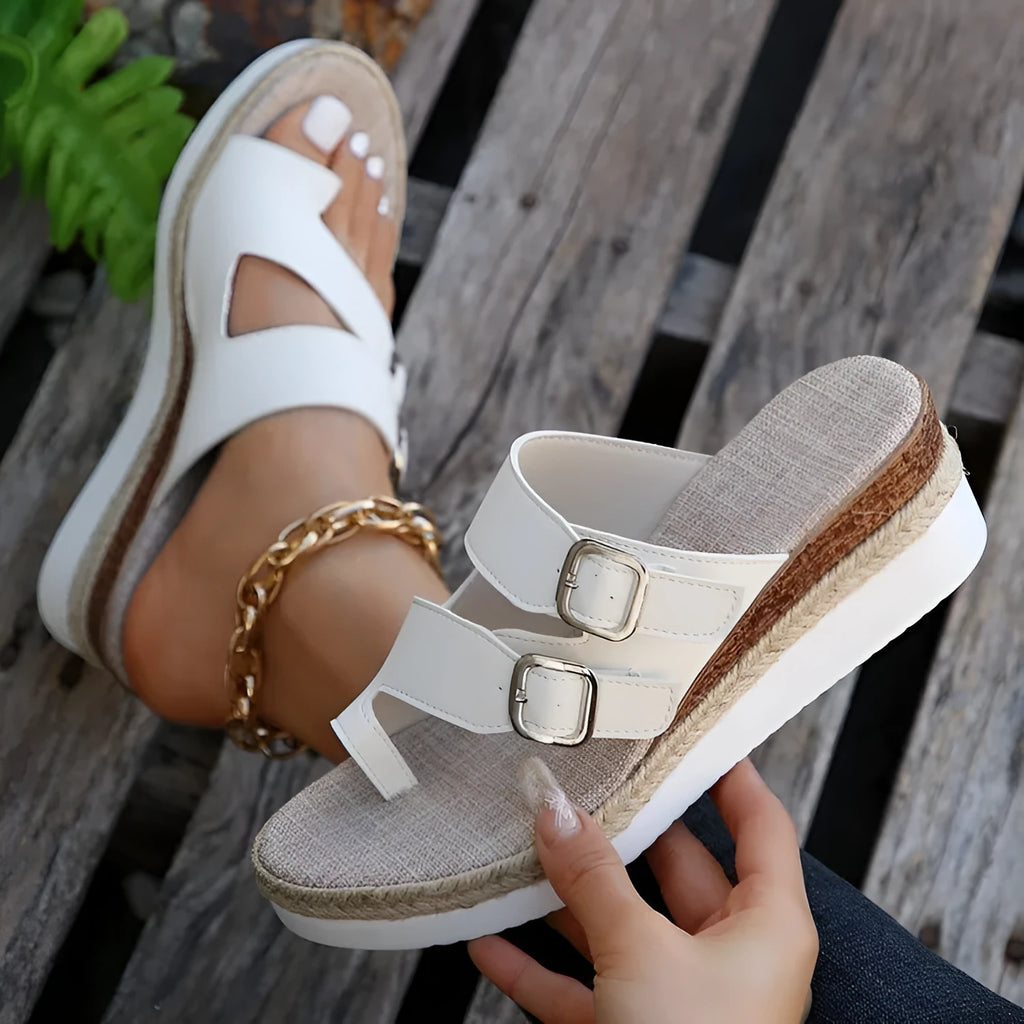 White woven patent leather wedge sandals with peep toe and finger fit design