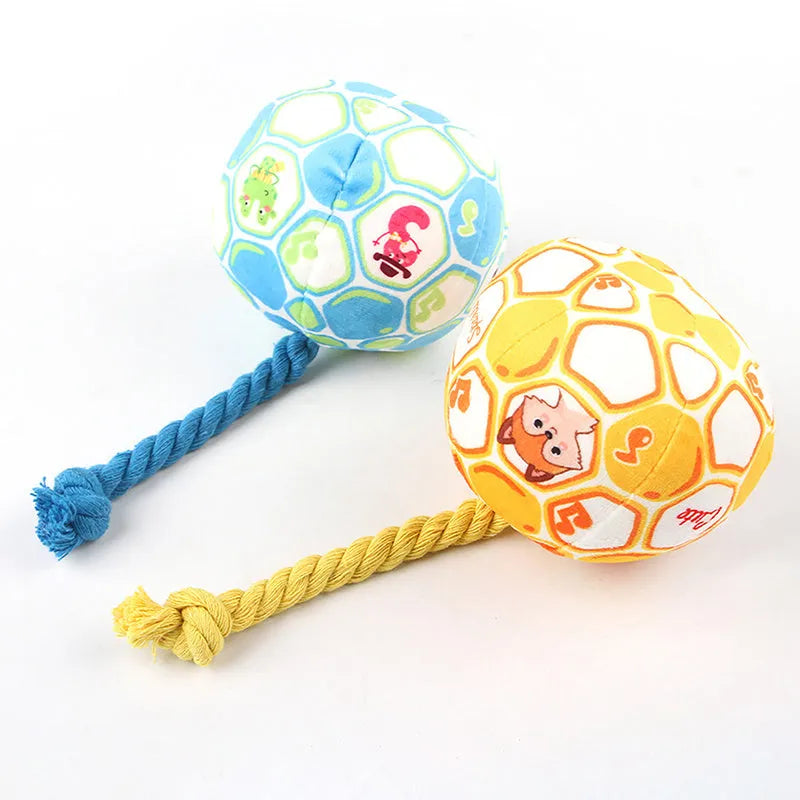 Blue and yellow elastic football tug of war dog toy with cotton rope ball for interactive play