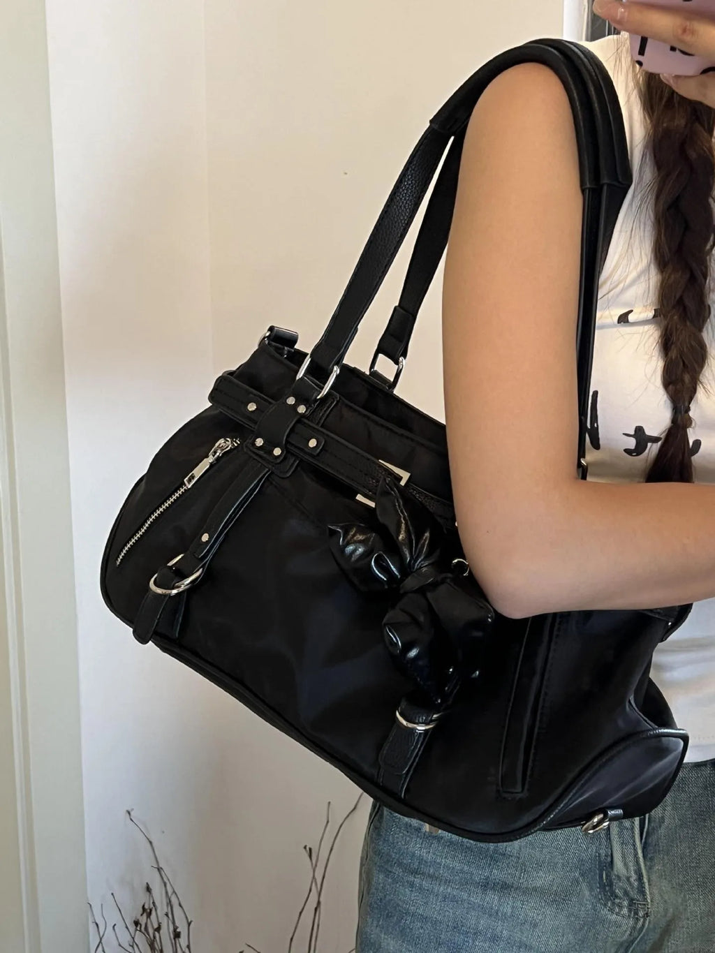 Soft PU motorcycle satchel with headwind texture, underarm design, horizontal square shape in black colour