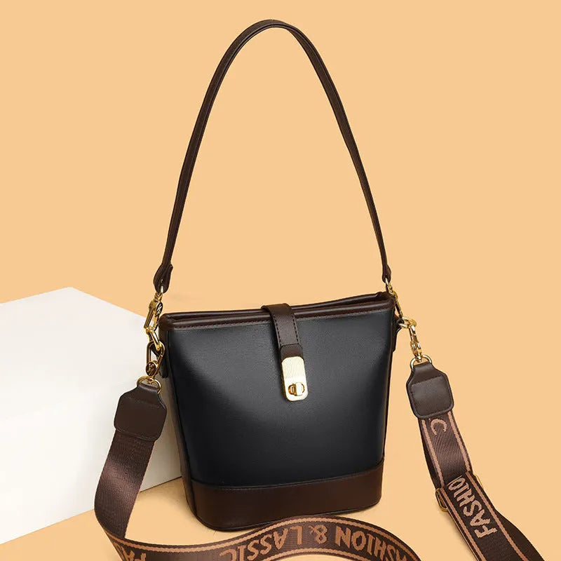 Korean-style soft PU bucket shoulder messenger bag in black colour with double straps and organised interior