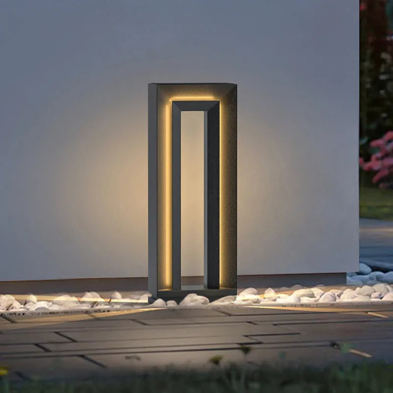 Square stainless steel and acrylic solar courtyard garden lamp with geometric design for outdoor landscape lighting.