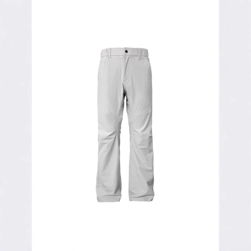 Man wearing grey 3D cut deconstructed casual trousers with a straight leg and elasticated waistband.